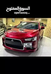  22 ميتسوبيشي لانسر موديل 2015 GT اصلي فحص كامل بحالة الوكاله فل كامل اعلى صنف من فئتها