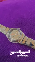  2 > ساعة Swatch Irony أصلية للبيع  ستانلس ستيل كاملة عرض يوم وتاريخ مقاومة للماء   ( تحتاج فقط بطارية)
