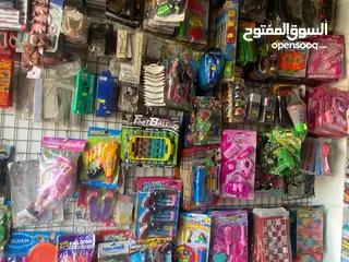  20 بضاعه مكتبه للبيع والمحل للإيجار