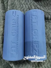  1 Fat gripz اداه رياضيه لجعل مسكه البار عند التدريب اكبر لتطور عضلي اكبر