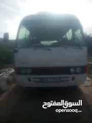 1 باص عمومي تويوتا كوستر