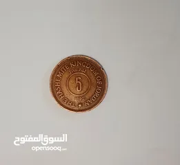  2 عملات قديمه دولار و اردني