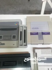 2 اجهزة واشرطه اتاري نينتدو  وفملي واتاري 2600