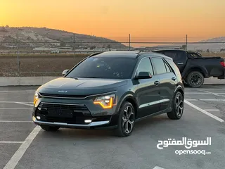  1 كايا نيرو  هايبرد (بنزين+كهرباء ) فل الفل  فتحة سقف  لون مميز اضافات مميزة  2022