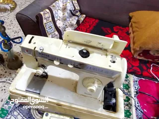  2 مكينة خياطه كهرباء singer 2405