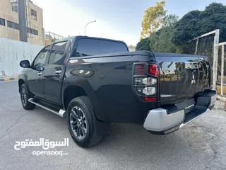  12 ميتسوبيشي L200 سبورتيرو موديل 2022 وارد الشركة أعلى صنف مع ديفلوك مالك واحد للبيع
