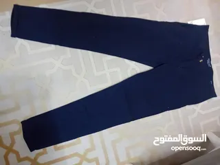  8 شروات ملابس رجالي بنطلون جينز وكتان وقميص وشرت البضاعه جديد البضاعه صنع تركي وصيني العدد 610