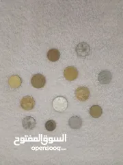  12 عملات نقدية مغربية وعربية وأروبية