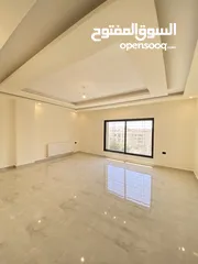  6 شقة طابق اخير مع روف 230 متر وتراس 100 متر على شارعين  طريق المطار خلف المدارس العالمية بسعر مميز
