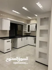  18 مطابخ خشب  مطابخ اللمنيوم أماراتي بجميع الألوان بكفالة 10 سنوات