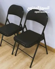  8 كراسي طوي لون اسود جلد ومعدن