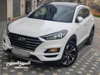  4 هونداي توسان فل الفل اضافات دهان شركة وعداد أصلي 70000كم فقططط رخصة وتأمين شامل للبيع بسعر مغري