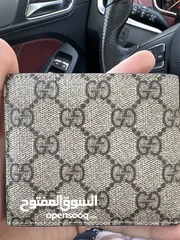  2 Gucci Wallet Used