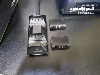  4 Xbox Series X بحالة الكرتونة + إيدتين + ألعاب أصلية + ملحقات شاحن لاسلكي+ نظام تبريد rgb ومداخل usb
