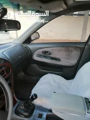  7 ميتسوبيشي لانسر موديل 1997 فل كامل ماعدا القير
