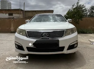  1 كيا اوبتما لوتسي 2009 لون ابيض بحالة جيدة جدا