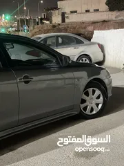  8 ميتسوبيشي لانسر فراشة موديل 2016  فحص 3جيد 1ضربة على الراس السيارة فل كامل فتحة وجلد السيارة نضيفة