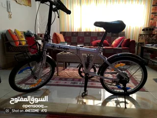  8 بسكليت ياباني اصلي  نوع جيب قياس 20 7غيارات بحاله وكاله بنطوي ياباني مش صيني بسعر مناسب