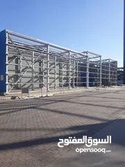  18 بناء الهناجر و الهياكل المعدنية و المباني الحديدية و المكاتب و الابنية متعددة الطوابق