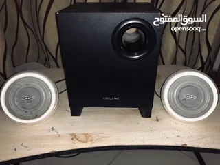  1 كيسه تايجر وسماعه creative جوده فوق متوسطه