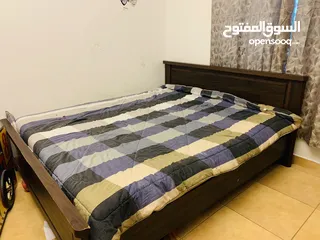  1 Wooden bed  in good condition with free mattress