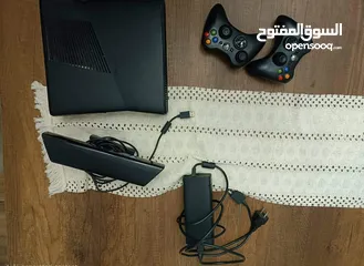  1 XBOX 360 Slim مهكّر + ألعاب + Kinect + 2 يدات أصلية
