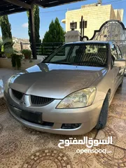  1 ميتسوبيشي لانسر 2006
