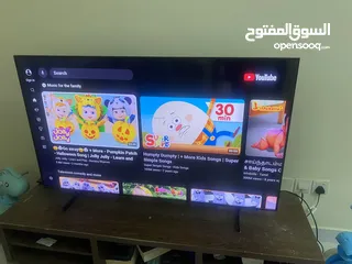  4 Samsung 55” Crystal UHD AU8000 With Compact TV Table