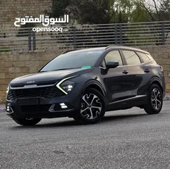  1 كيا سبورتاج هايبرد 2023 - فل كامل مع بانوراما - غرفة مميزه - عداد قليل اصلي - إمكانية التقسيط.