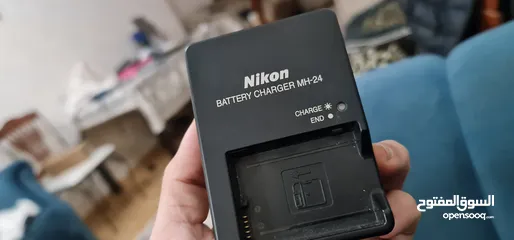  7 كاميرا نيكون D5200 كأنها جديده لم تستعمل عداد الشتر 7k + عدستين (18-55+55-200)