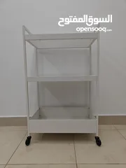  1 Multipurpose trolley and a table.