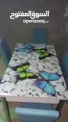  2 طاولة قزاز سكريت مع 6كراسي جلد