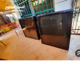  1 شبابيك المنيوم برونز زجاج عسلي عدد 15 مع كامل الكسسوارات