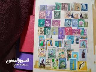  9 نيشان ملكى وزن41, 41 جرام من الدهب والفضه وعقدفضه من الاحجار الكريمه وطوابع قديمه نادره