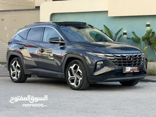  1 هونداي توسان 2022 هايبرد plug in  4*4 فل اضافات مع بانوراما  271 حصان