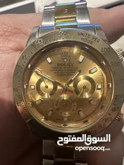  1 Rolex gold daytona