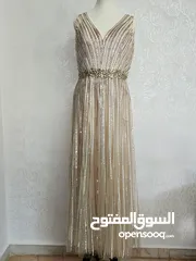  14 فساتين مستعملة للبيع. القطعة الواحدة