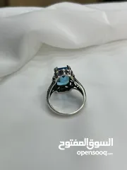  16 *خاتم فضة بحجر أكوامارين – عيار 925، وزن 5.4 جرام