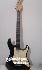  1 Yamaha electric guitar EG112C.