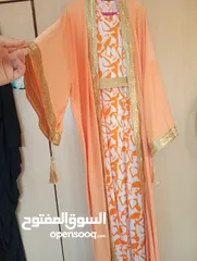  5 بشت قطعتين لبسة واحدة جميل جدا وراقي ع اللبس لونه برتقالي السعر*12 دنانير بتلبس وزن 100ك