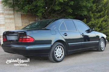  2 E200. 2002  قرش ونص 2002  رقم الهاتف بالوصف