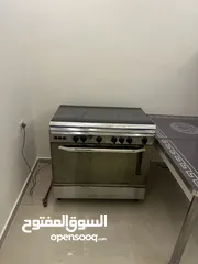  5 ثلاجهsharp مع طاوله سفر بدون كراسي مع غاز مستعمل بحاله جيده