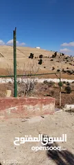  22 قفقفا 13 دنم منطقة مزارع وشاليهات وطبيعة خلابة مسيجة جدار حجر