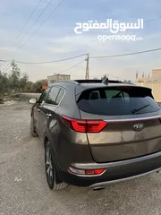  2 كيا سبورتج ماتور 2000 و4*4 بنوراما هاند و كراسي كهربا سعرر حررق