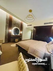  17 Two rooms and a hall for monthly rent in Ajman, overlooking the creek, new furnishings, Al Rashidiya