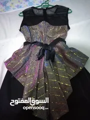  2 فستان سواريه ذهبي في اسود