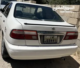  1 نيسان صني 1999 وارد ياباني ماتور 1500 قطارة بنزين ...... قابل للتفاوض والشرا ما بقصر معه ...