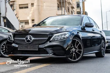  1 Mercedes C200 2019 Mild hybrid Amg kit   السيارة وارد الشركة و قطعت مسافة 60,000 كم فقط