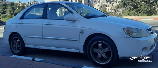  5 كيا سيراتو 2006 ماتور 1600 اوتومات. دهان اصلي مع تصليح عيوب بسيطة في البودي