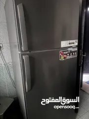  1 Super genanal refrigerator and LG washing machine